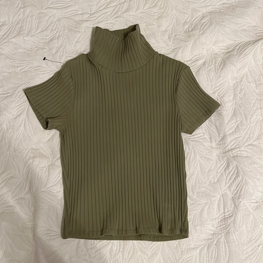 green turtleneck top